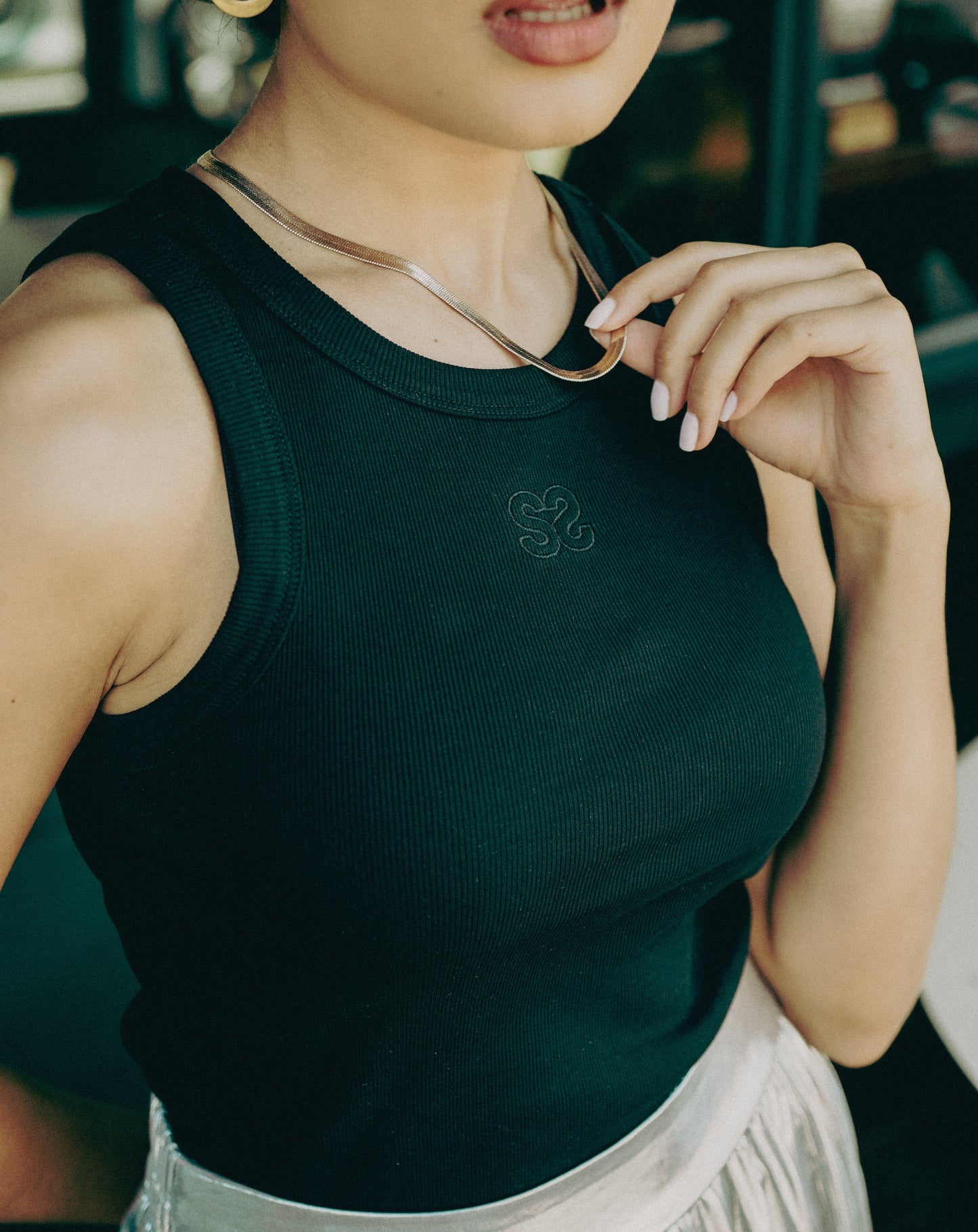 Marina Logo Vest Black - Knit Tops